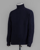 Model: Dolcevita
Article: 7.CI10
Color: Navy
Composition: 90% Wool 10% Cashmere
Made in Florence, Italy G.R.P. Firenze Wool & Cashmere Rollneck / Navy