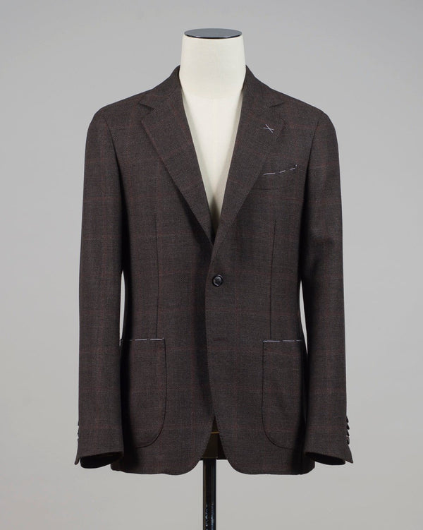 Patch pockets
Half lined
Unconstructed shoulder
Model: GJ02
Article: TW21212F
Color: 6970 / Dark Brown &amp; Wine
Composition: 100% Virgin Wool
Made in Italy Gaiola Windowpane Jacket / Dark Brown